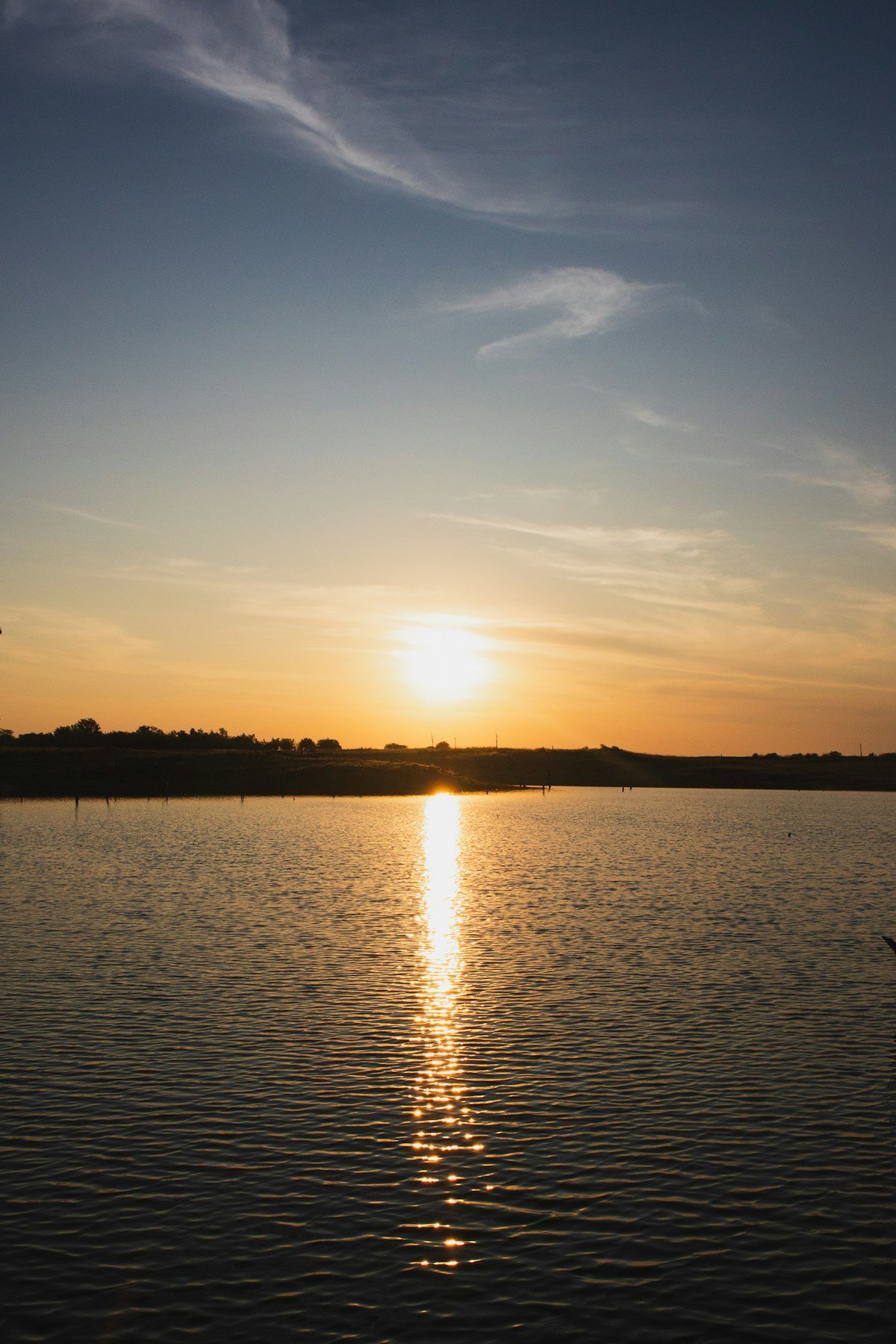 Sunset over Lake Kariba, the vast man-made reservoir in Zimbabwe