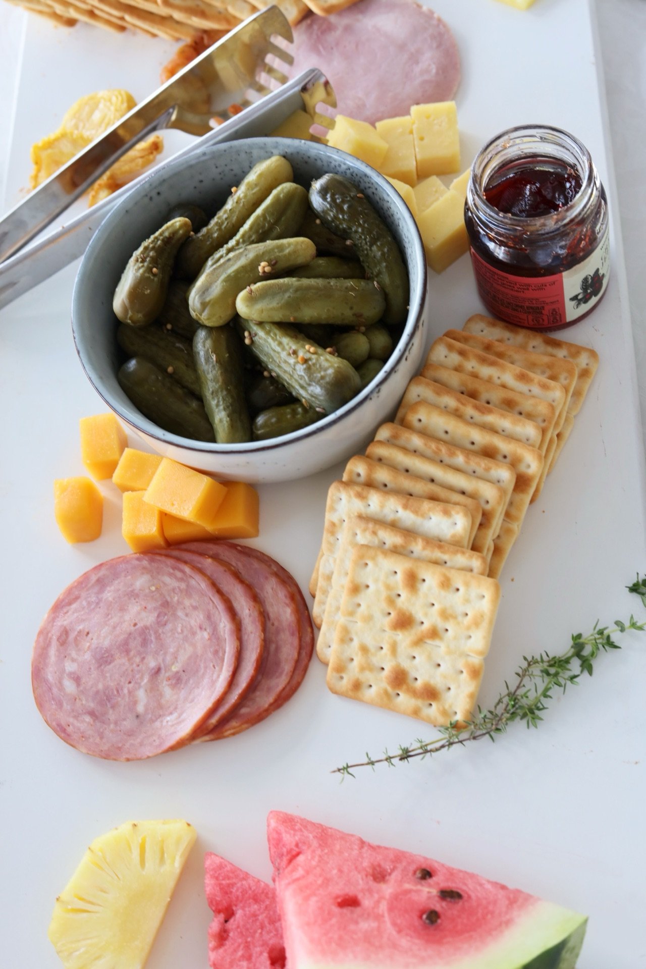 A charcuterie board with cheese, pickles and crackers at a cafe in Bulawayo, Zimbabwe