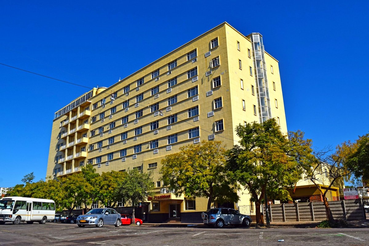 Colonial-era building in Bulawayo city centre against a blue sky, Zimbabwe