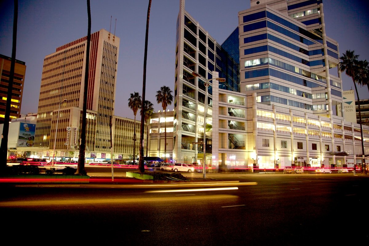 Harare city skyline at night with illuminated office buildings, Zimbabwe
