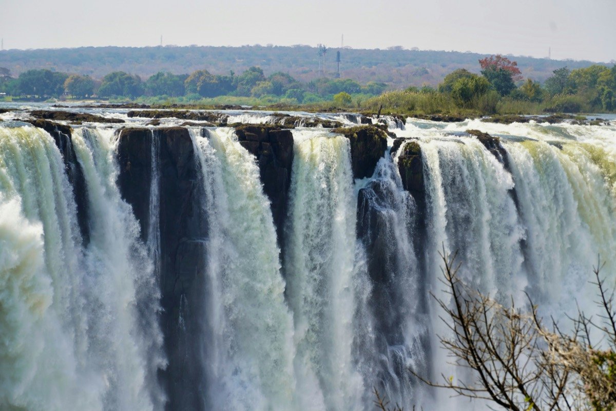Water falls in the middle of the forest, Victoria Falls, Zimbabwe