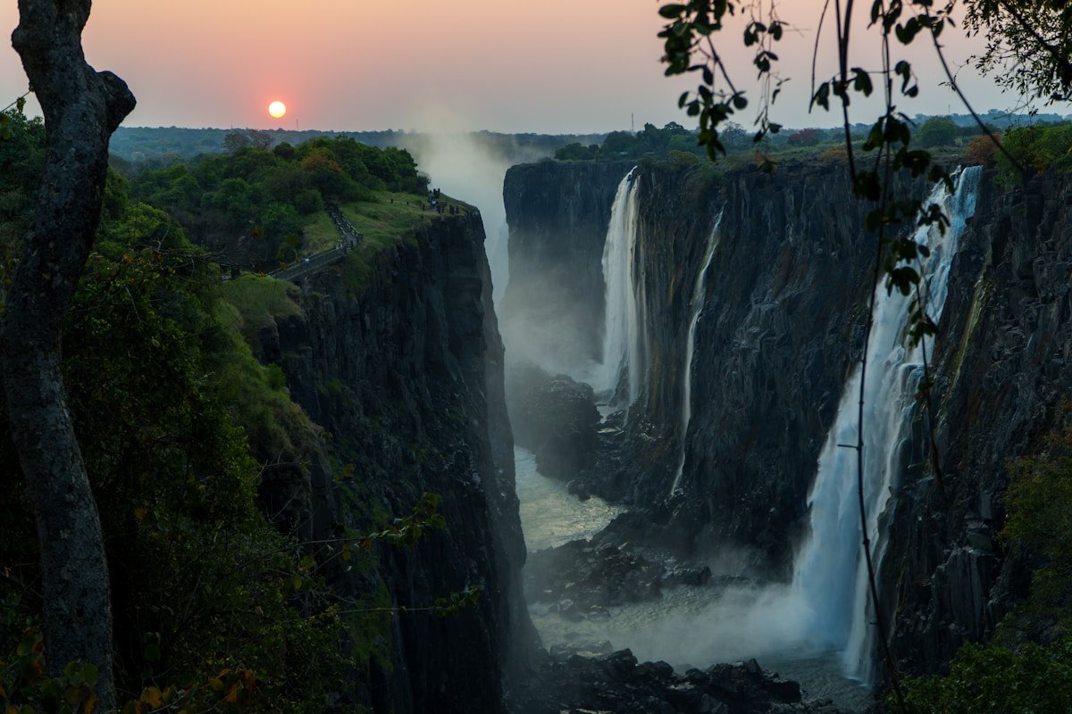 Victoria Falls cascading into the gorge at sunset, Zimbabwe