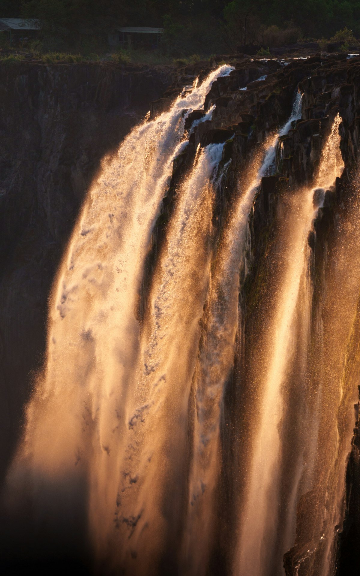 View of Victoria Falls spray and rainforest from the Zimbabwean side